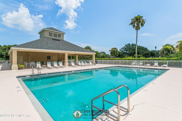 view of swimming pool featuring a patio area