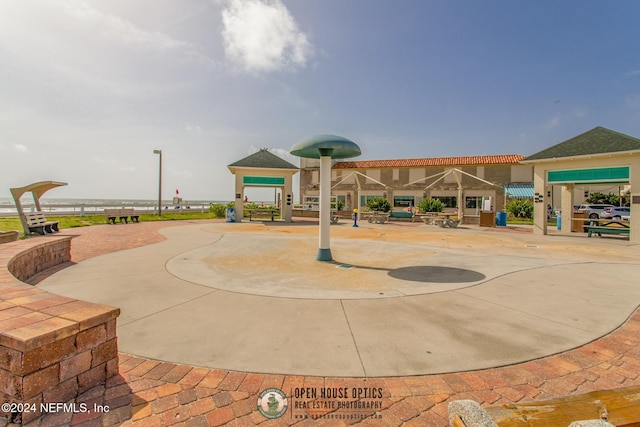 view of property's community with a patio