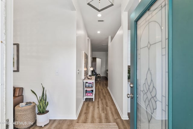 foyer entrance with light wood-type flooring