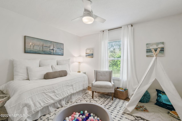 bedroom featuring ceiling fan