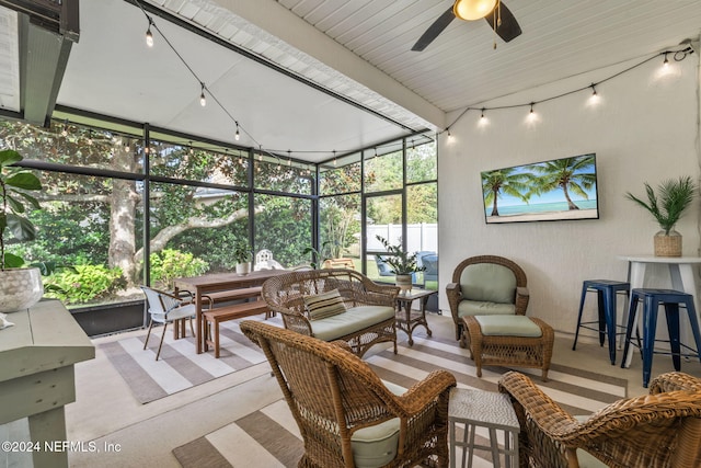 sunroom / solarium with ceiling fan