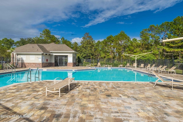 view of pool featuring a patio