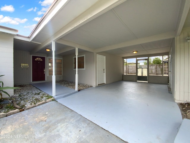 view of patio / terrace featuring a carport