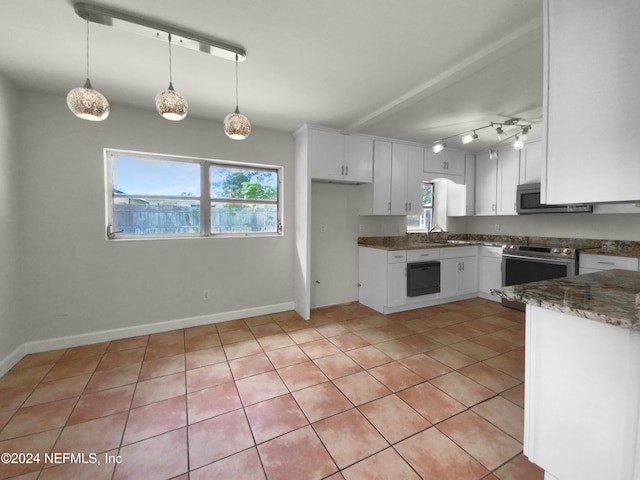 kitchen with white cabinets, beam ceiling, hanging light fixtures, light tile patterned floors, and appliances with stainless steel finishes