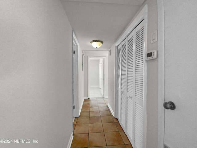 hall featuring tile patterned floors