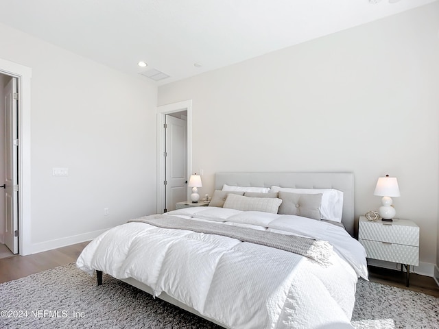 bedroom featuring wood-type flooring