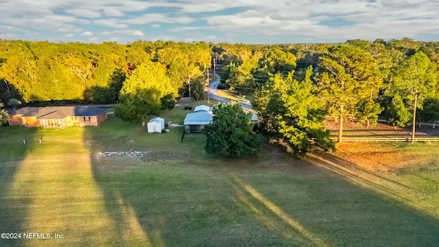 birds eye view of property with a rural view