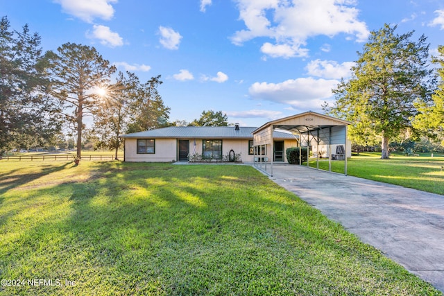 ranch-style house with a front lawn