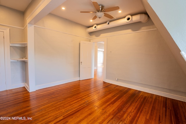 spare room with hardwood / wood-style flooring and ceiling fan