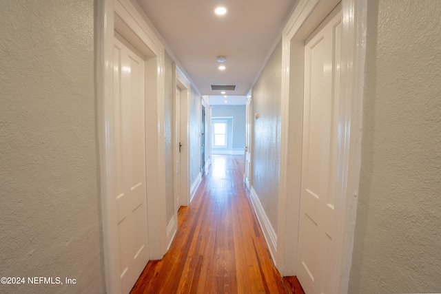 hall featuring dark hardwood / wood-style floors