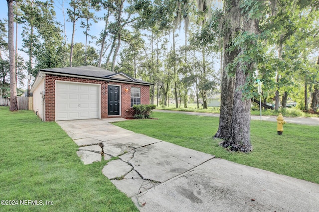 exterior space with a front yard and a garage