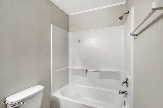 bathroom with toilet, shower / bathing tub combination, a textured ceiling, and ornamental molding