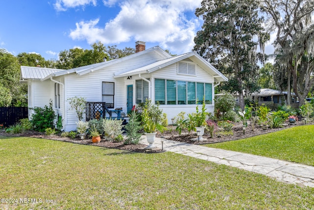 view of front of house with a front yard