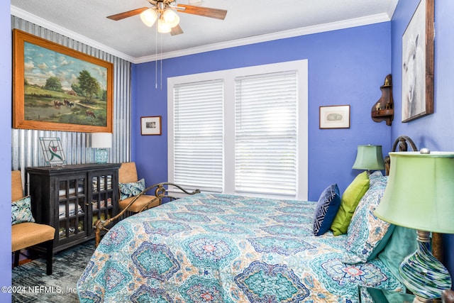 bedroom with ornamental molding, a textured ceiling, and ceiling fan