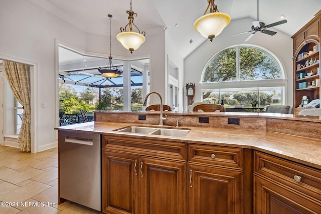 kitchen with sink, ornamental molding, ceiling fan, pendant lighting, and dishwasher