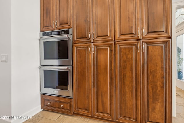 kitchen with stainless steel double oven