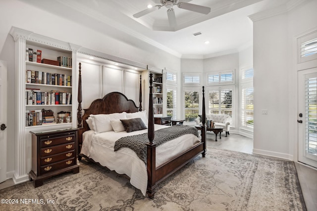 bedroom featuring crown molding, access to outside, multiple windows, and ceiling fan