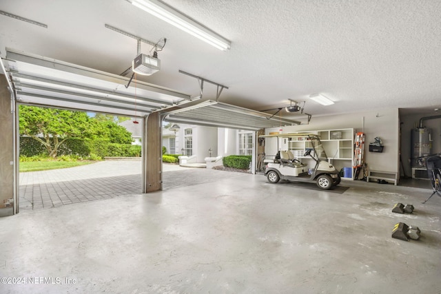 garage featuring a garage door opener and gas water heater