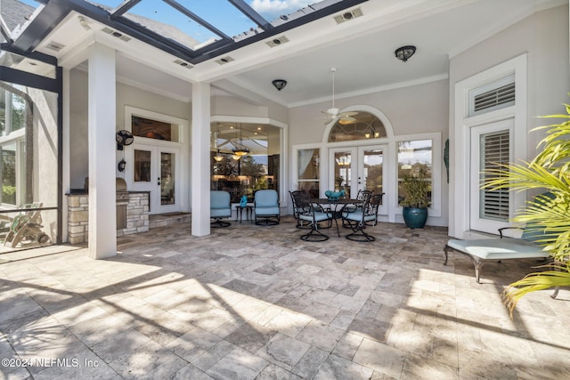 view of patio / terrace with ceiling fan, french doors, and grilling area