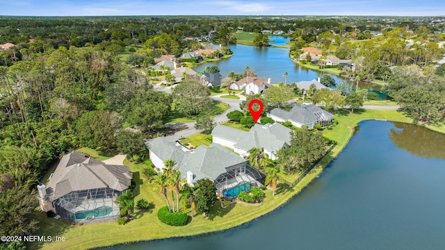 drone / aerial view with a water view