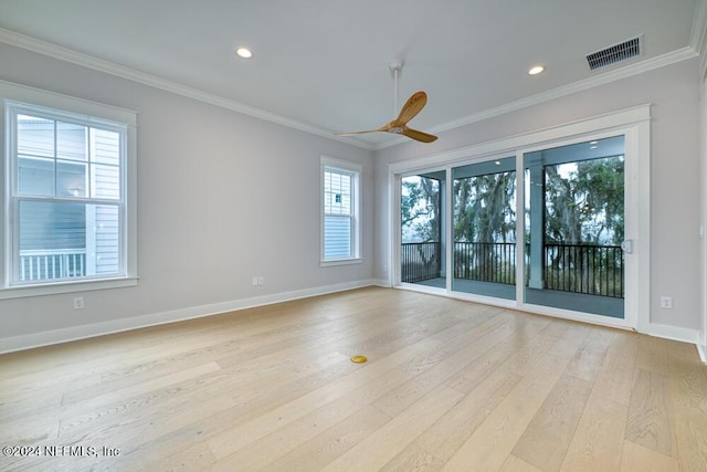 unfurnished room with light wood-type flooring, ceiling fan, and ornamental molding