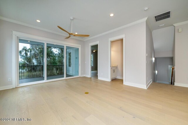 interior space featuring ceiling fan, crown molding, and light wood-type flooring