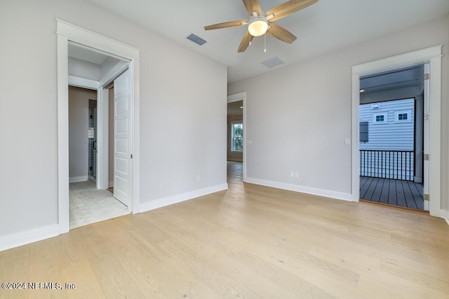 unfurnished room featuring ceiling fan and light hardwood / wood-style flooring