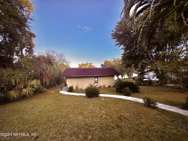 5609 County Road 352, Keystone Heights, FL 32656 - view of home's exterior featuring a lawn