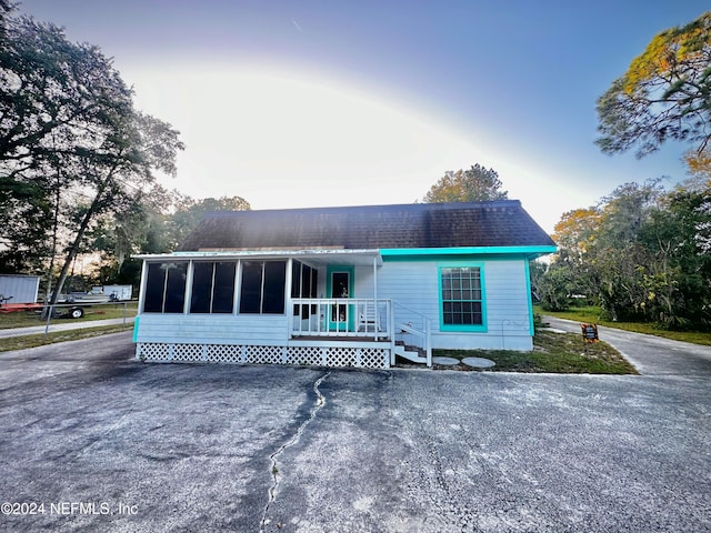 view of front of home featuring covered porch