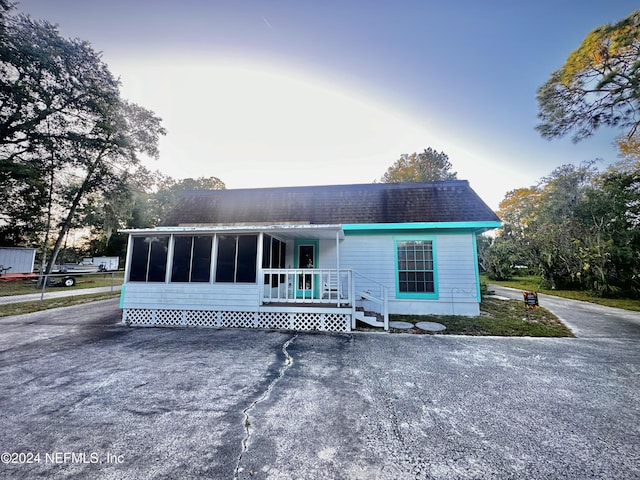 5609 County Road 352, Keystone Heights, FL 32656 - view of front of home featuring a sunroom