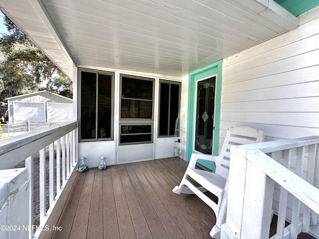 5609 County Road 352, Keystone Heights, FL 32656 - wooden deck with an outdoor structure