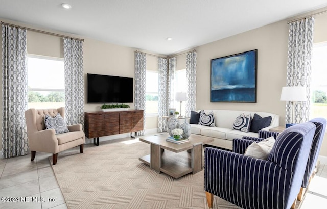 tiled living room featuring a wealth of natural light