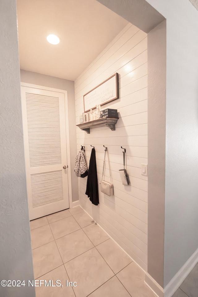 bathroom with tile patterned floors