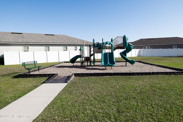 view of jungle gym with a yard