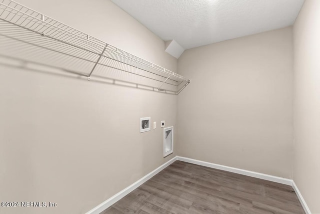 laundry room featuring hookup for an electric dryer, hardwood / wood-style floors, and washer hookup