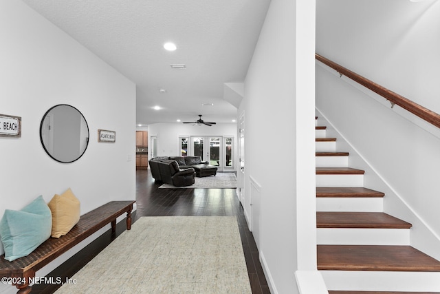 interior space featuring ceiling fan, visible vents, wood finished floors, a textured ceiling, and recessed lighting