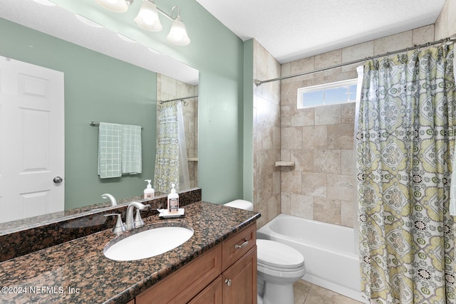 full bath featuring vanity, tile patterned flooring, a textured ceiling, toilet, and shower / bath combo