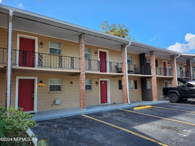 4836 Atlantic Blvd Unit 106, Jacksonville, FL 32207 - view of building exterior featuring uncovered parking
