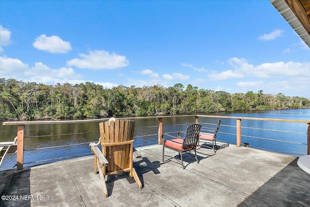 dock area featuring a water view