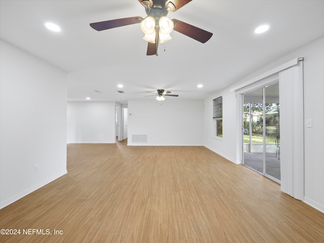 unfurnished living room with light hardwood / wood-style floors and ceiling fan