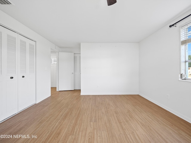 unfurnished bedroom with light hardwood / wood-style flooring