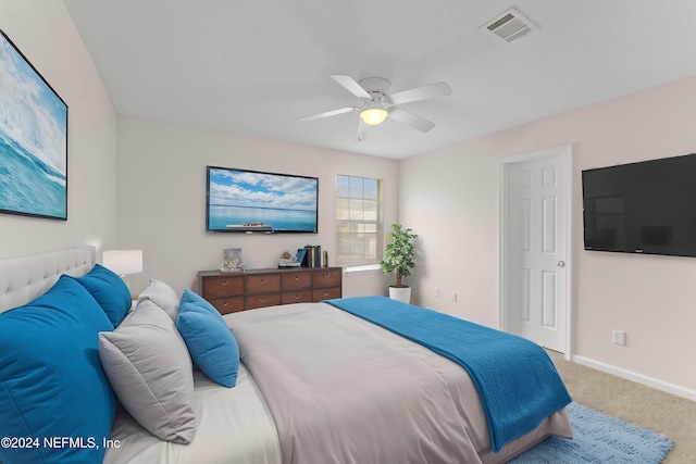 bedroom featuring ceiling fan and carpet flooring