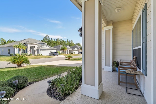 view of patio with a garage