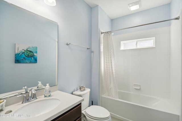 full bathroom with vanity, toilet, and shower / bath combo with shower curtain