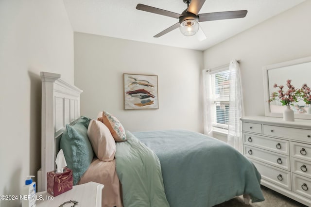 carpeted bedroom featuring ceiling fan