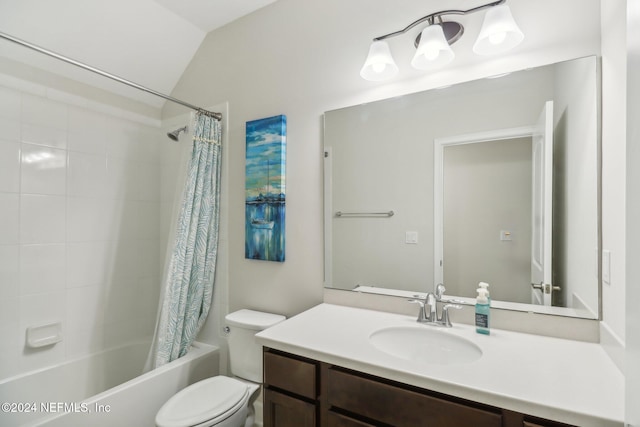 full bathroom featuring vanity, vaulted ceiling, shower / bath combo with shower curtain, and toilet