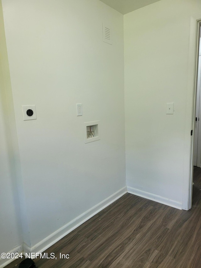 clothes washing area featuring hookup for an electric dryer, dark hardwood / wood-style floors, and washer hookup