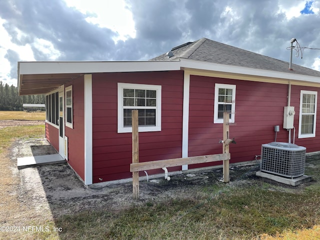 view of home's exterior featuring central AC