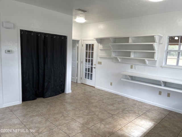 kitchen with light tile patterned floors