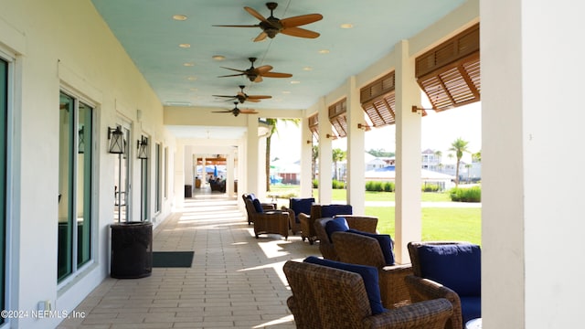 view of patio featuring ceiling fan